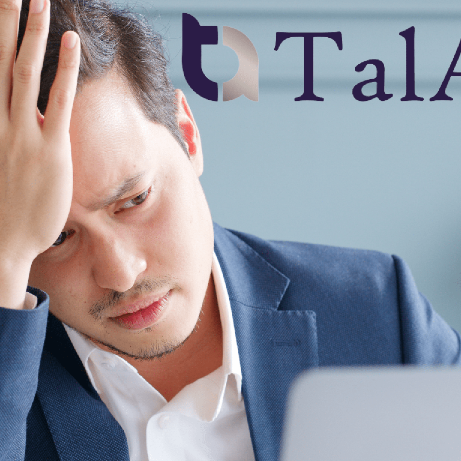 Employee reads email telling him he is sacked.